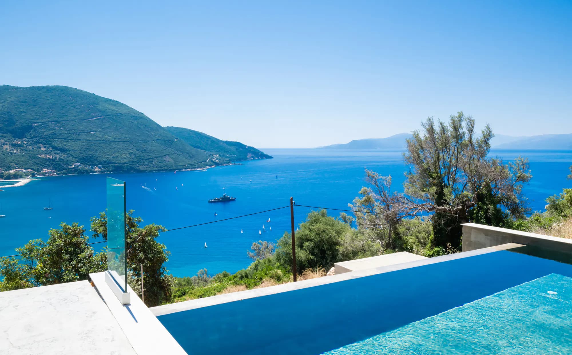 Infinity pool edge overlooking the Ionian Sea at Azzura Villas